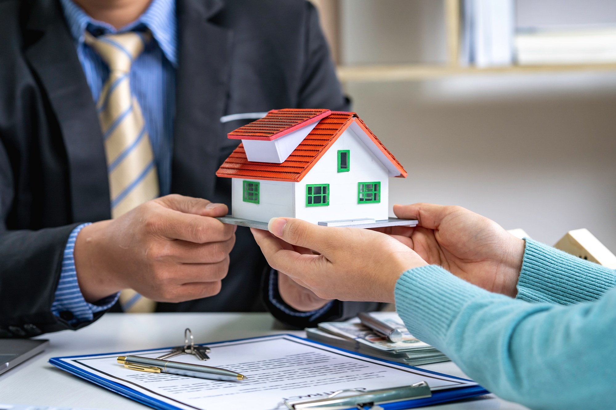 Sale purchase contract to buy a house, Customer sending money buying home loan and giving keys from